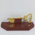 21st Key On Wooden Stand