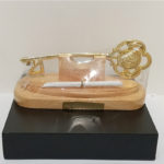 21st Key On Wooden Stand